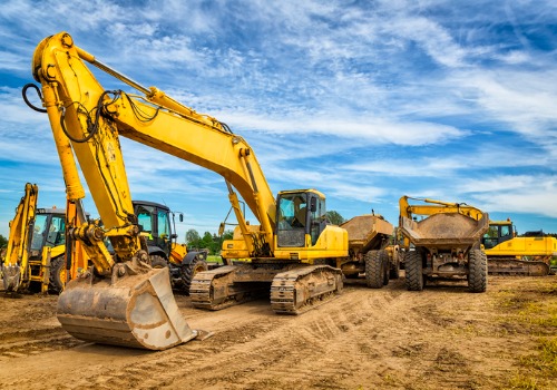 Construction machinery flattening land during Excavation Services in Pekin IL