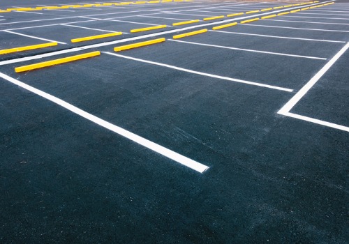 Finished parking lot after commercial asphalt paving in Bloomington IL was completed.