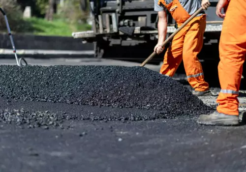 Hoerr's Blacktop, a Pavement Contractor Near You in Peoria IL, lays asphalt for a new roadway